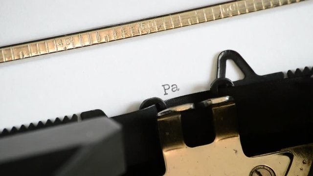 Typing the expression Part Three with an old manual typewriter