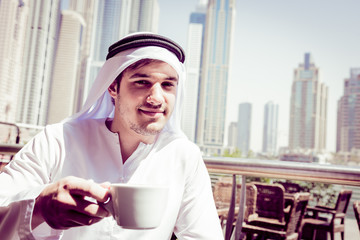 Young Arabian Man Having Coffee