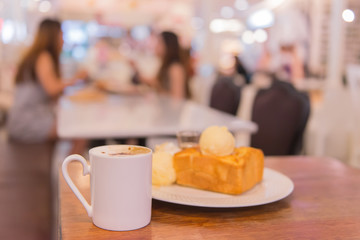 hot coffee with toast in cafe shop