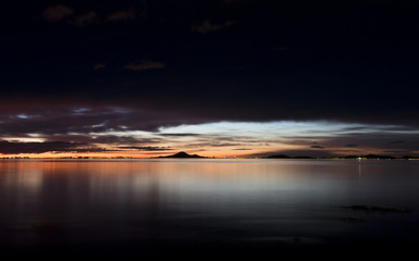 Los Alcazares, Region of Murcia, Spain. Sunrise at seaside with sun reflection on water. 