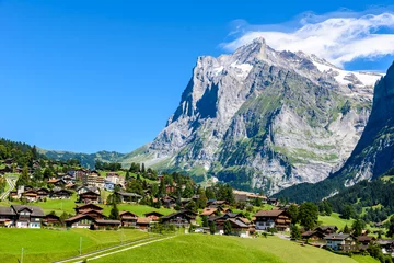 Foto op Canvas Grindelwald - beautiful village in mountain scenery -  Switzerland © Simon Dannhauer