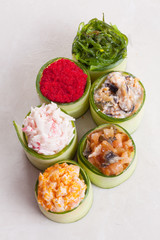 Assorted sushi wrapped in cucumber large masago, shrimp, salmon, crab, Chuka, the six pieces