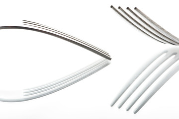 Concept with fork on white background XII / The abstract concept of a simple subject