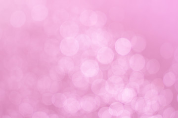 Abstract defocused lights pink tone lights background.