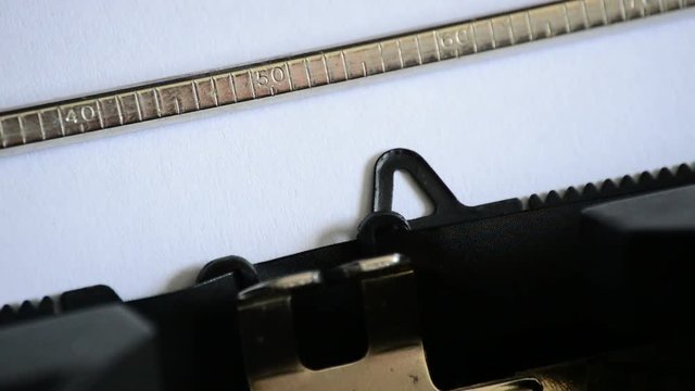 Typing the word Message: with an old manual typewriter