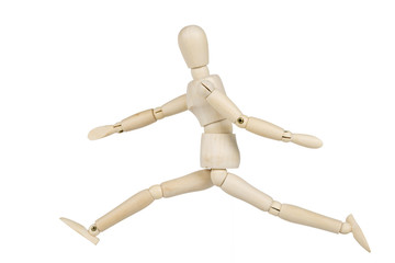 Wooden Mannequin jumping isolated on the white background.