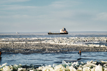 winter fishing on the sea the bright sun