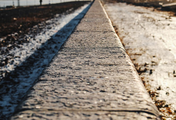 concrete wall receding into the distance