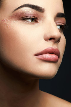 Beauty Make-up with glitter eye shadows