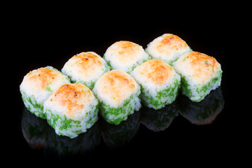 Japanese rolls on black background