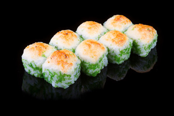 Japanese rolls on black background