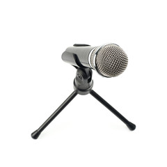 Black microphone on a rack isolated