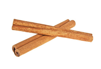 Two cinnamon sticks isolated on white background