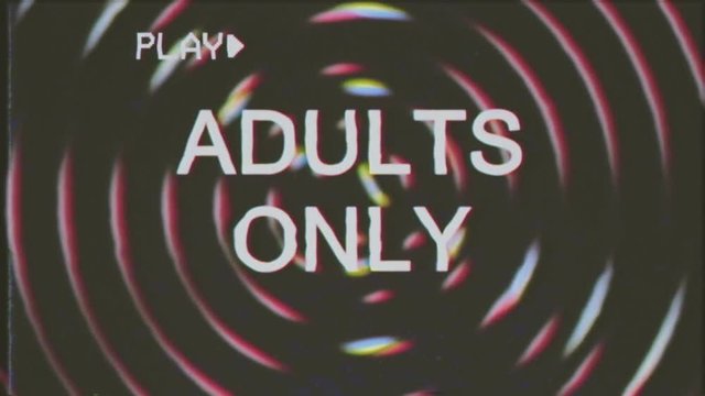 VHS retro fake shot: the text Adults only appears over a set of spinning circles with a lens flare at the beginning. Grindhouse low-budget b-movie style.
