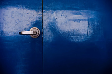 Blue Door with Silver handle for background or texture.