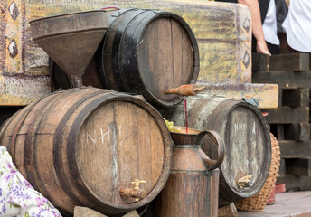 old barrels and tools for wine production