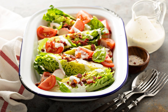 Wedge salad with baby lettuce and tomatoes