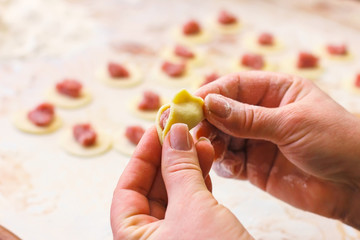 process for preparing ravioli with meat,