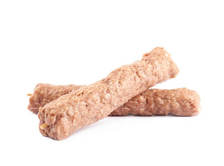 Raw kebab meat on a stick
