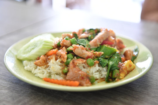 .Stir fried pork and curry paste, Thai food.