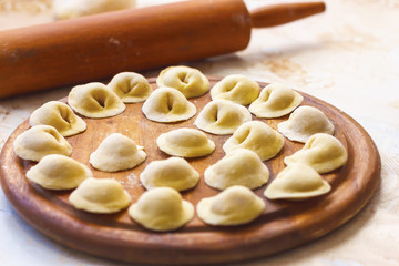 homemade meat dumplings, raw tortellini and ravioli