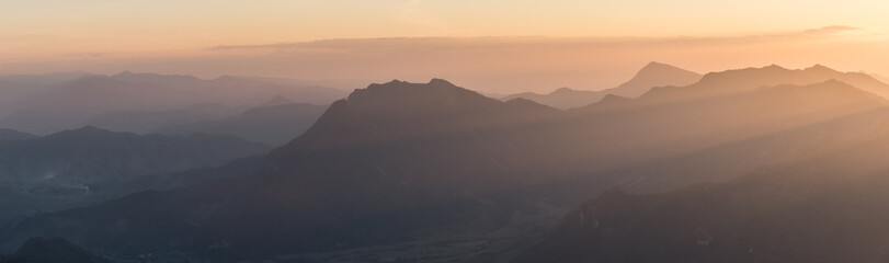 Silhouette panorama of layer mountain in the morning, north of Thailand
