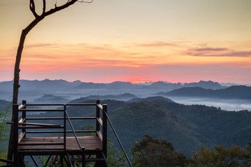 Beautiful Viewpoint and Sunrise with mist, sky and cloud view from top mountain at Phu Bo Bit, Loei, Thailand