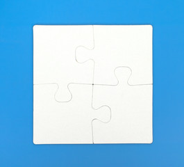 Four pieces of puzzle are connected together