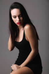 Fototapeta premium Fashion portrait of beautiful young woman