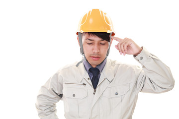 頭痛を訴える男性