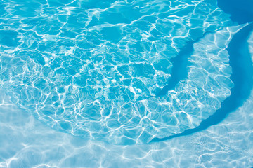 Blue swimming pool background. Summer and water concept