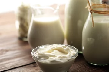 Crédence de cuisine en verre imprimé Produits laitiers milk products - tasty healthy dairy products on a table on: sour