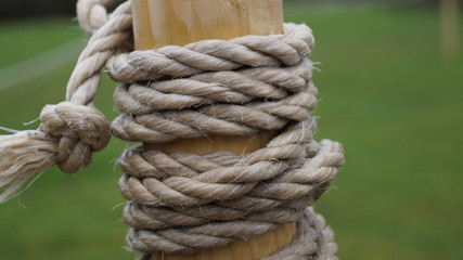 Fototapeta premium Close-up of rope tied around a wooden post