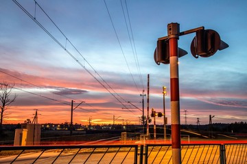 level crossing in evening lights