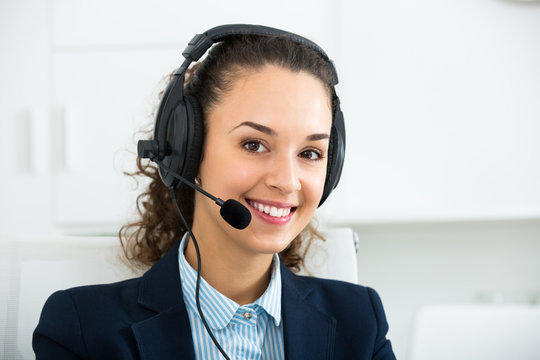 Portrait of glad woman working in call center