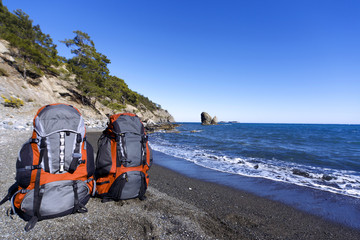 Backpacks on the beach in the summer campaign.