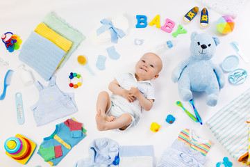 Baby with clothing and infant care items