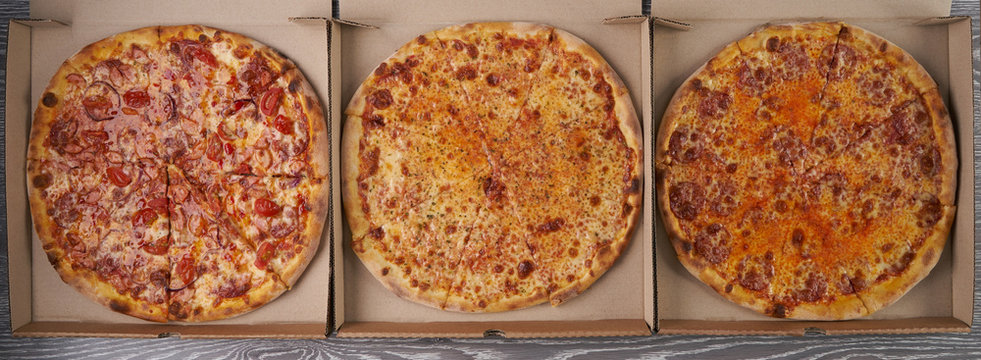 Combo with three different slices of Italian hot and tasty pizzas closeup from top. For advertisement or web design, promo, special price