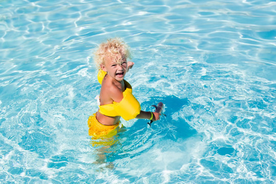 Little boy in swimming suit