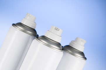Aerosol spray cans nozzle closeup. Spray cans with shallow depth of field. Air freshener product...
