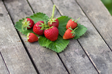 Fresh strawberries on wooden table