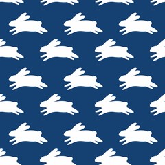 Seamless pattern with white rabbits