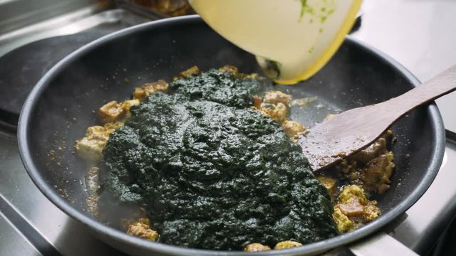vegetarian dishes Palak paneer. Spinach and paneer in a pan
