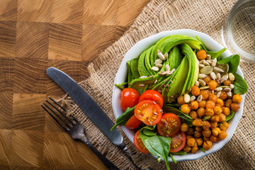 Vegeterian buddha bowl - balanced meat with spinach, chicken pea and avocado