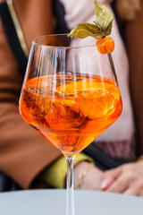 Aperol Spritz in the glass on the table.