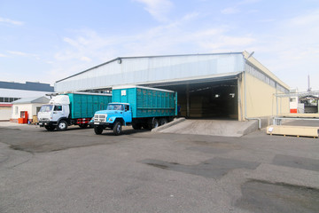 trucks and transporter in factory of production useful for background