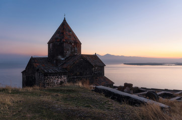 Scenic view of an old Sevanavank church in Sevan at sunset