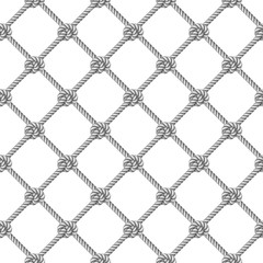 Fototapeta premium Seamless pattern, background, gray rope woven in the form fishing net, isolated on white background