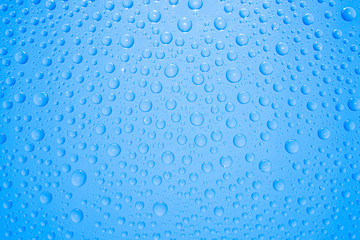 Water drops on blue background