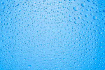 Water drops on blue background
